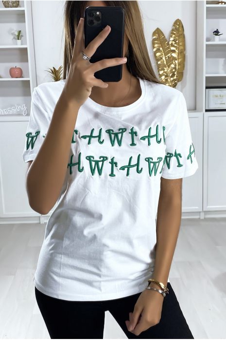 white shirt with green writing