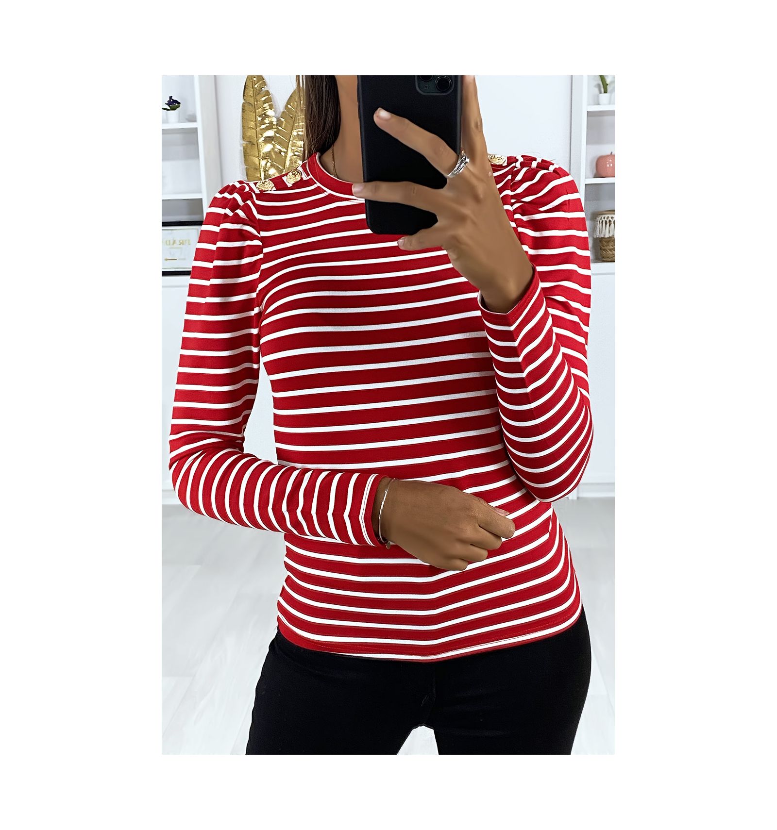 Long Sleeved Red And White Striped Top With Gold Buttons On The Shoulders